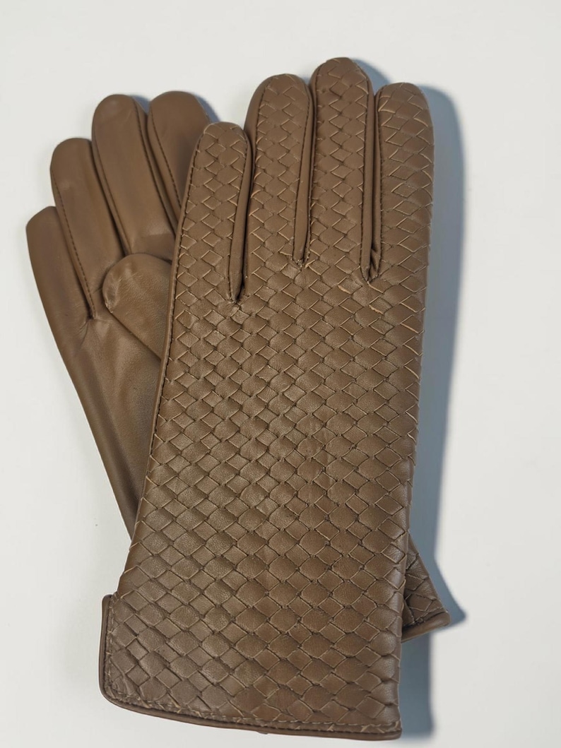 woven leather gloves with intrecciato texture, genuine sheepskin lining and smooth palm.