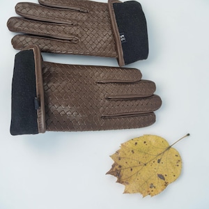 woven leather gloves with intrecciato texture, genuine sheepskin lining and smooth palm.