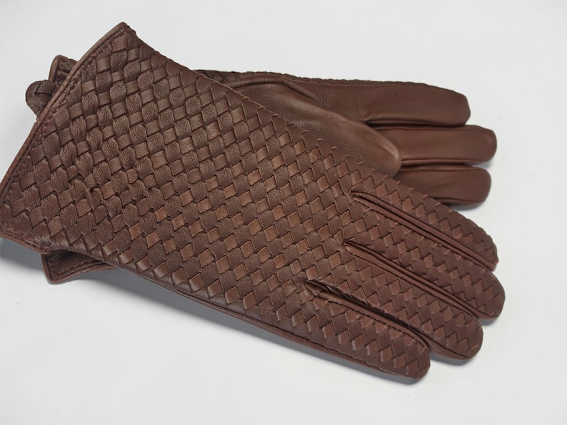 woven leather gloves with intrecciato texture, genuine sheepskin lining and smooth palm.