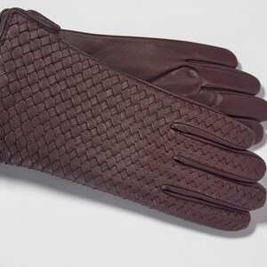 woven leather gloves with intrecciato texture, genuine sheepskin lining and smooth palm.