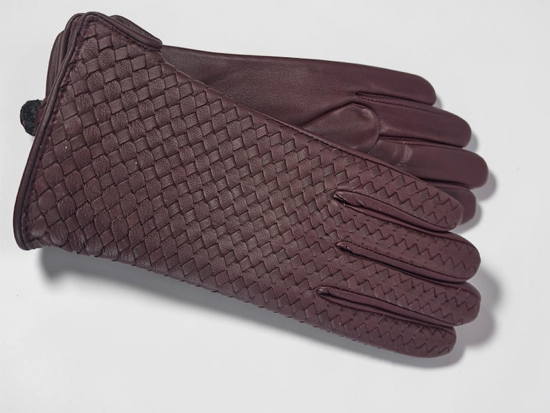 woven leather gloves with intrecciato texture, genuine sheepskin lining and smooth palm.