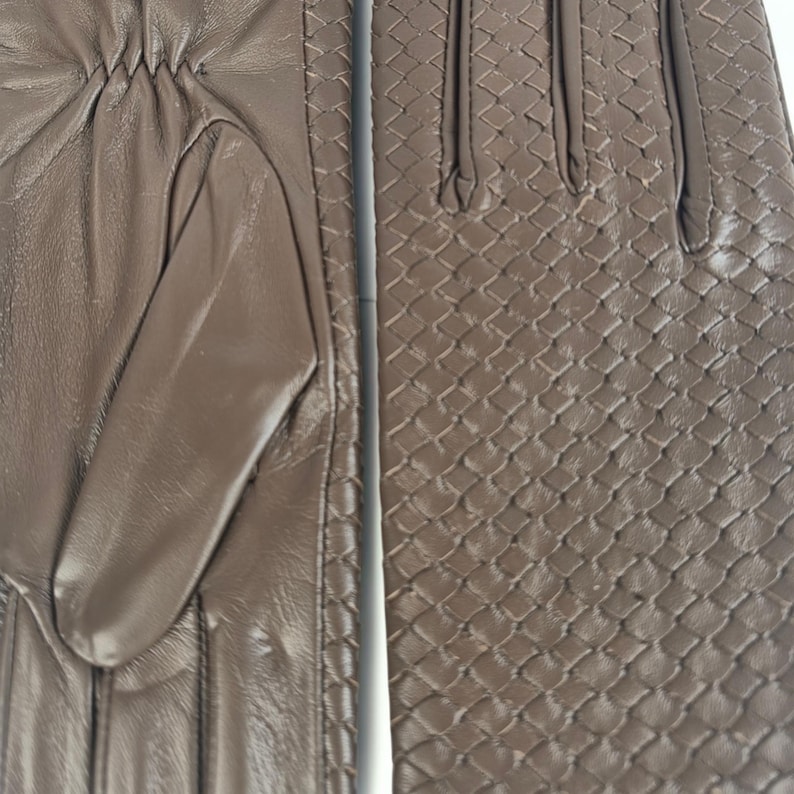 woven leather gloves with intrecciato texture, genuine sheepskin lining and smooth palm.