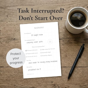 May include: A white mug filled with coffee sits next to a black pen and a sheet of paper with the text "WAYPOINT" and "Task Interrupted? Don't Start Over." A circular sticker reads "Protect your progress."