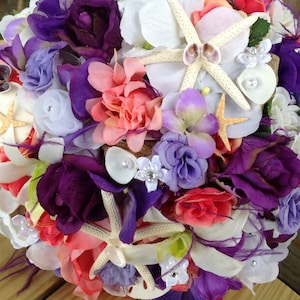 Beach Wedding Seashell Coral and Purple Bridal Bouquet with Feathers Roses Hydrangeas Orchids Starfish and Diamond Trim