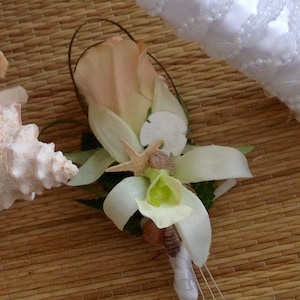 Peachy Beach Groom's Seashell Rose and Orchid Boutonniere with lots of Tiny Seashells Bear Grass