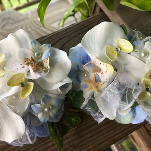 Custom Beach Seashell Wrist Corsages for Special Events You choose the color  Here is a Blue and White with a Touch of Yellow and Pearl Trim