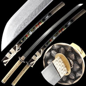 May include: An ornate katana sword with a patterned blade and a decorative handle. The scabbard is black with floral and fruit designs. The sword's handle is wrapped in a gold-colored material.