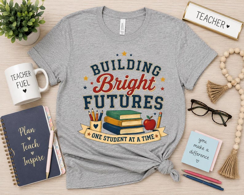 Camiseta "Construindo Futuros Brilhantes" | Homenagem aos Professores, Livros Escolares e Design da Apple imagem 1