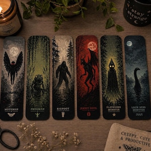 Cryptiden boekenleggerset, griezelige leesaccessoires met Mothman, Bigfoot en Frogman.