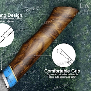May include: A close-up of a kitchen knife with a wooden handle and a blue and gold accent. The blade has a patterned design. Text on the image reads "Full Tang Design" and "Comfortable Grip".