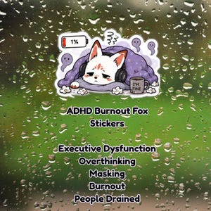 May include: A sticker featuring a white fox with headphones, under a purple blanket, and a mug that says "I'm Fine." The sticker also includes text that says "ADHD Burnout Fox Stickers" and other related terms.