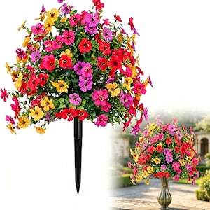 Peut inclure: Un arrangement floral artificiel vibrant avec un mélange de fleurs rouges, roses, jaunes et violettes. Les fleurs sont fixées à un piquet noir pour une installation facile dans un jardin ou une jardinière. Un deuxième arrangement est présenté dans un vase.