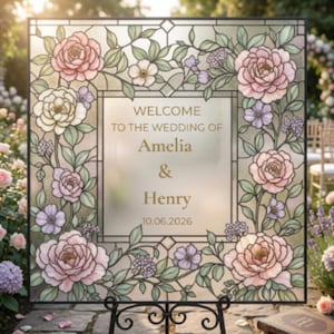 May include: A stained glass wedding welcome sign featuring a floral design with pink, white, and purple roses and greenery. The sign reads "Welcome to the Wedding of Amelia & Henry 10.06.2026". The sign is displayed on a black metal stand.