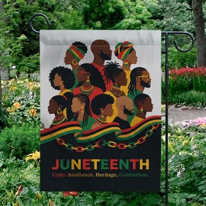 May include: A Juneteenth garden flag featuring a diverse group of people in profile, wearing colorful head wraps and jewelry. The flag has a black banner with the word "JUNETEENTH" and the text "Unity. Resilience. Heritage. Celebration."