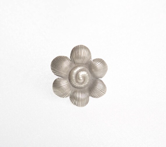 Un grande anello di best sale fiori