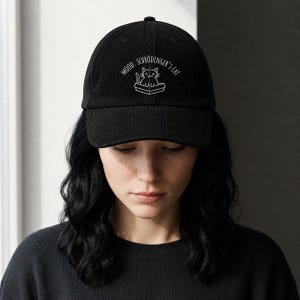 Stämning: Schrödingers katt, Vintage manchestermössa (broderi)