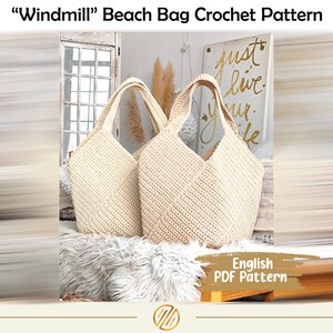 May include: Two cream-colored crochet beach bags with beige handles are displayed on a fluffy white surface. The bags have a diagonal stitch pattern and a V-shaped opening. The image includes text that reads "Windmill" Beach Bag Crochet Pattern and "English PDF Pattern."
