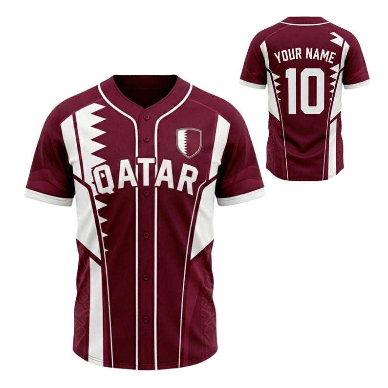 May include: Maroon baseball jersey with white detailing and the word "QATAR" across the chest. The jersey has a button-down front, short sleeves, and a Qatar emblem. The back of the jersey displays the number 10 and the text "YOUR NAME".