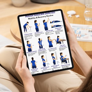May include: A tablet displaying a guide for frozen shoulder exercises. The screen shows illustrations of various mobility and recovery routines, including pendulum circles, wall walks, and towel stretches. The text "Frozen Shoulder Exercises" is at the top.