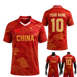 May include: A red short-sleeve jersey featuring a gold cloud and wave pattern, a V-neck collar, and the text CHINA on the front. The back displays the text YOUR NAME and the number 10 in gold. A small Chinese flag is printed on the chest.
