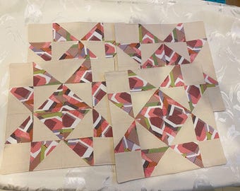 Un juego de 4 manteles individuales de retazos