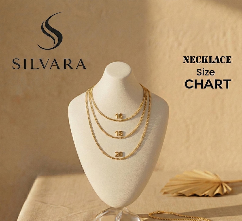 May include: A gold-colored necklace display on a white mannequin. The necklaces are 16, 18, and 20 inches long. The image includes the text "SILVARA" and "NECKLACE Size CHART". The background is a light brown color.