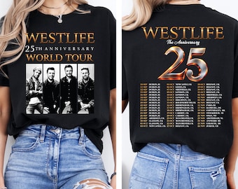 May include: A black t-shirt featuring a Westlife 25th Anniversary World Tour graphic. The front displays the band members in four panels with gold text. The back features a large metallic 25 and a list of tour dates and locations in white text.
