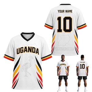 May include: A white V-neck jersey featuring the word UGANDA in black letters, a grey crane graphic, and black, yellow, and red side stripes. The back displays the number 10 and the text YOUR NAME above a faint outline map of Uganda.