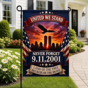 May include: A rectangular garden flag featuring a sunset skyline with the Twin Towers, a bald eagle in flight, and American flag patterns on the sides. Text reads: UNITED WE STAND, NEVER FORGET 9.11.2001, and LAND OF THE FREE BECAUSE OF THE BRAVE.