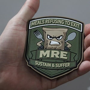 MRE Morale Patch – Meals Refusing to Exit, Sustain & Suffer PVC Tactical Gear Hook-and-Loop Badge