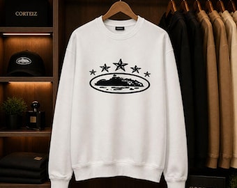 ホワイトのグラフィックコットン製スウェットシャツ、スターエンブレムクルーネック、ミニマルストリートウェア、ユニセックスプルオーバー