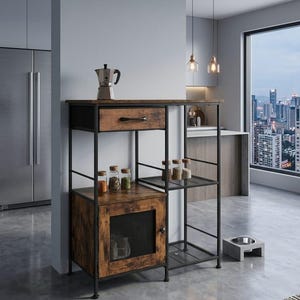 May include: A rustic kitchen island with a dark metal frame and wooden shelves, drawer, and cabinet. The cabinet door has a wire mesh front. A stainless steel coffee maker sits on top. Jars of spices are visible on the shelves.