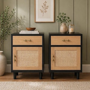 May include: Two black and wood nightstands with a drawer and a door. The drawer and door frame are light wood, with a woven cane door panel. Gold-toned hardware and black legs complete the design.