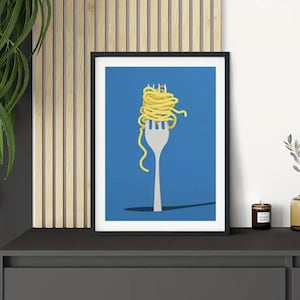 May include: A framed art print featuring a minimalist design of yellow spaghetti on a silver fork against a blue background. The artwork is in a black frame and is a modern kitchen or dining room decor.