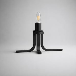 May include: A set of three ceramic nesting bowls in graduating sizes. The bowls feature a speckled, off-white glaze with a slightly textured surface. The largest bowl is approximately 8 inches in diameter.