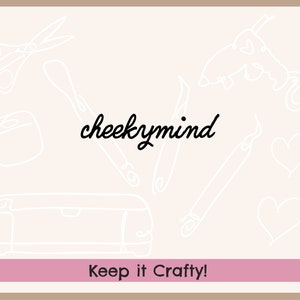 May include: A white background with a pink banner at the bottom that says "Keep it Crafty!"  The image features a variety of crafting tools, including scissors, a cutting machine, a spatula, and a paintbrush. The text "cheeky mind" is written in black cursive.