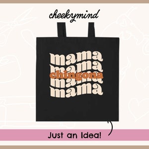 May include: Black tote bag with the text "mama chingona mama" in a retro font. The text is in cream and orange.