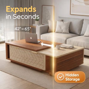 Puede incluir: Mesa de centro rectangular de madera con tapa de madera clara y base de madera más oscura. La mesa se extiende de 106,68 cm a 165,1 cm. Cuenta con almacenamiento oculto y un cajón decorativo con dibujos. Una computadora portátil y una taza de café están sobre la mesa.