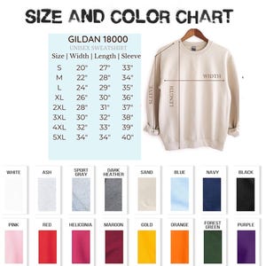 May include: A size and colour chart for a Gildan 18000 unisex sweatshirt. The chart displays measurements in inches for sizes S to 5XL, along with a colour palette including white, black, navy, and more. A beige sweatshirt is shown.
