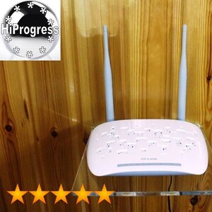 May include: A white wireless router with two antennas mounted on a clear acrylic shelf. The router has a white label with the text "TP-LINK" on it.
