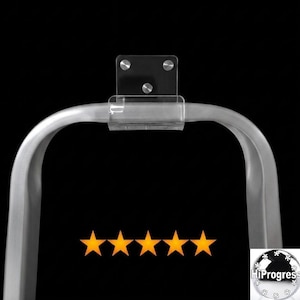 May include: A silver-coloured metal arch featuring a clear acrylic mounting bracket secured with three circular silver fasteners. Five orange stars are positioned horizontally below the arch, and a circular logo with the text HiProgress is visible.