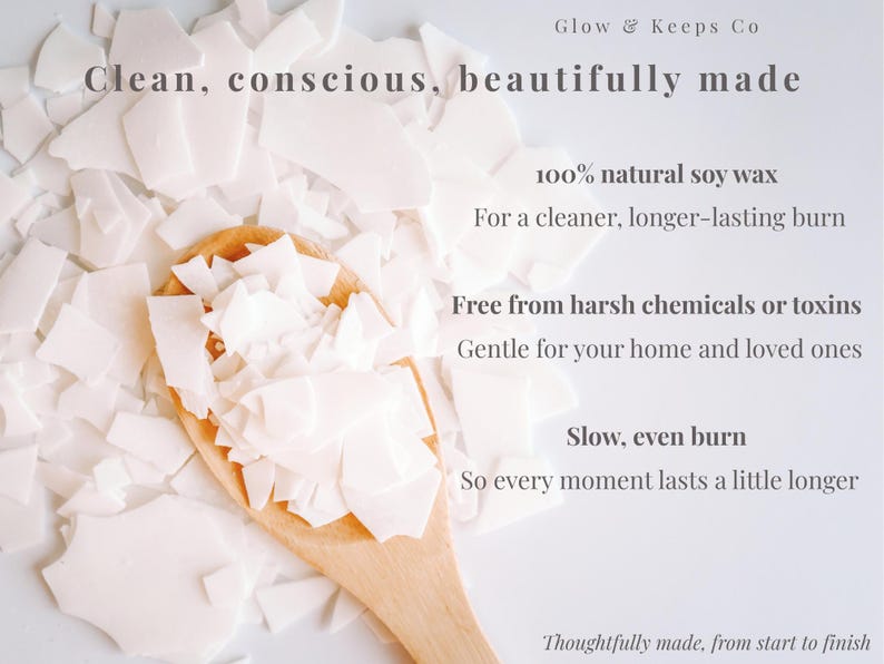 May include: A wooden spoon filled with white soy wax flakes. The image includes text that reads "Clean, conscious, beautifully made" and highlights the wax's natural composition and slow burn.