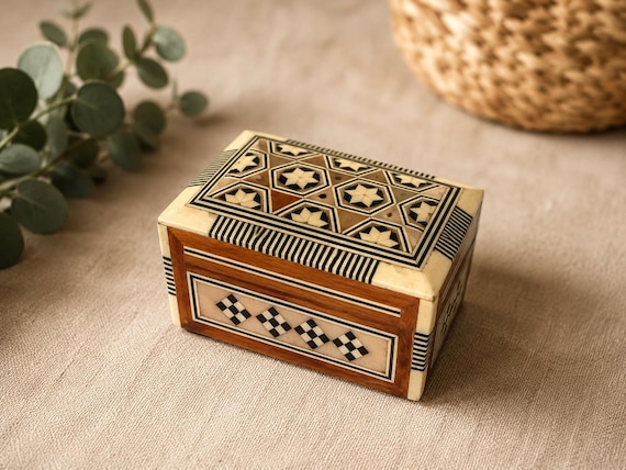 Vintage-style inlaid geometric wood jewelry box — the kind of heirloom-looking piece that feels like it came from a boutique, not a factory.