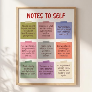 May include: A framed wall art print titled NOTES TO SELF featuring nine colorful square sticky notes arranged in a grid. Each note contains a different motivational message written in dark text, with small colored tape strips at the top of each.