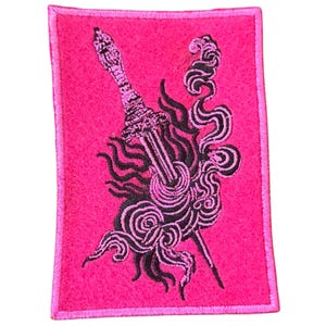 May include: A rectangular, hot pink patch featuring a black illustration of a sword piercing through swirling, stylized smoke or flames. The sword has intricate detailing, and the patch has a stitched border.
