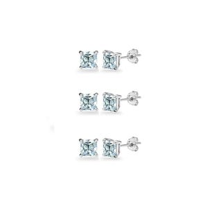 May include: Three pairs of square-cut, light blue gemstone stud earrings with silver posts and butterfly backs. The earrings are displayed against a white background, showcasing their simple elegance and sparkle.