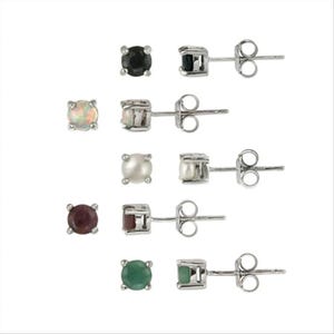 May include: Five pairs of stud earrings featuring various gemstones. The earrings have a silver-coloured metal setting. Gemstones include black, opal, pearl, ruby, and emerald. The earrings are presented against a white backdrop.