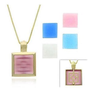 May include: A gold-toned necklace with a square pendant featuring a pink, rectangular stone. The necklace is displayed with samples of blue, pink, and white square stones. A smaller image shows the pendant with a decorative gold design.