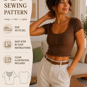 May include: A woman wearing a brown, ribbed crop top with a scoop neck and a button closure, paired with white pants and a brown belt. The image includes text that reads "PDF SEWING PATTERN" and "SIZE XS TO 2XL".