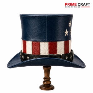 May include: A top hat featuring a blue crown with white stars and a red and white striped base. A black leather-like band with silver star studs and a metal buckle encircles the base. The text PRIME CRAFT ENTERPRISES appears in the top corner.